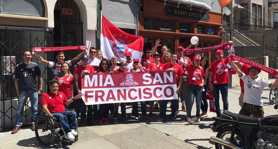 Mia San Francisco members holding official fan club banner outside Danny Coyle's Irish Pub in San Francisco